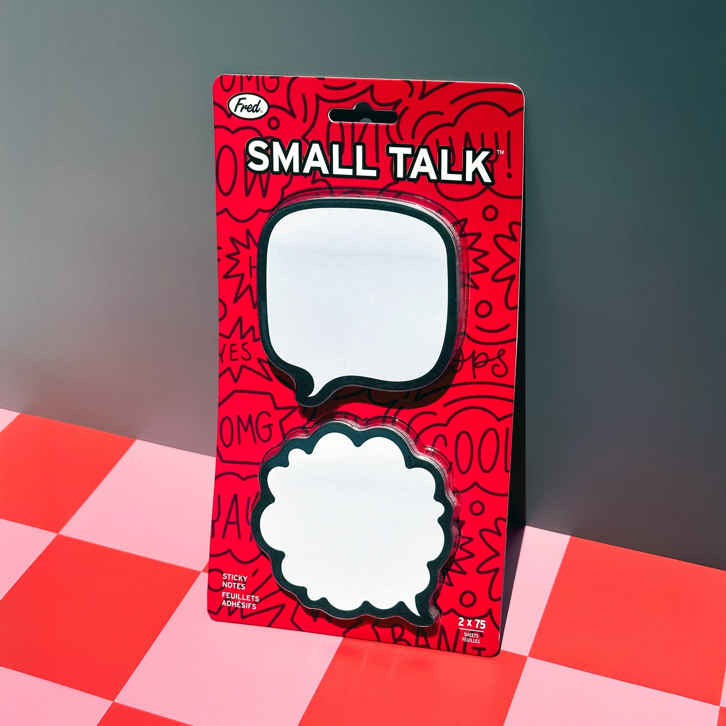 Packaged product with 'Small Talk' text on a red and black checkered surface.
