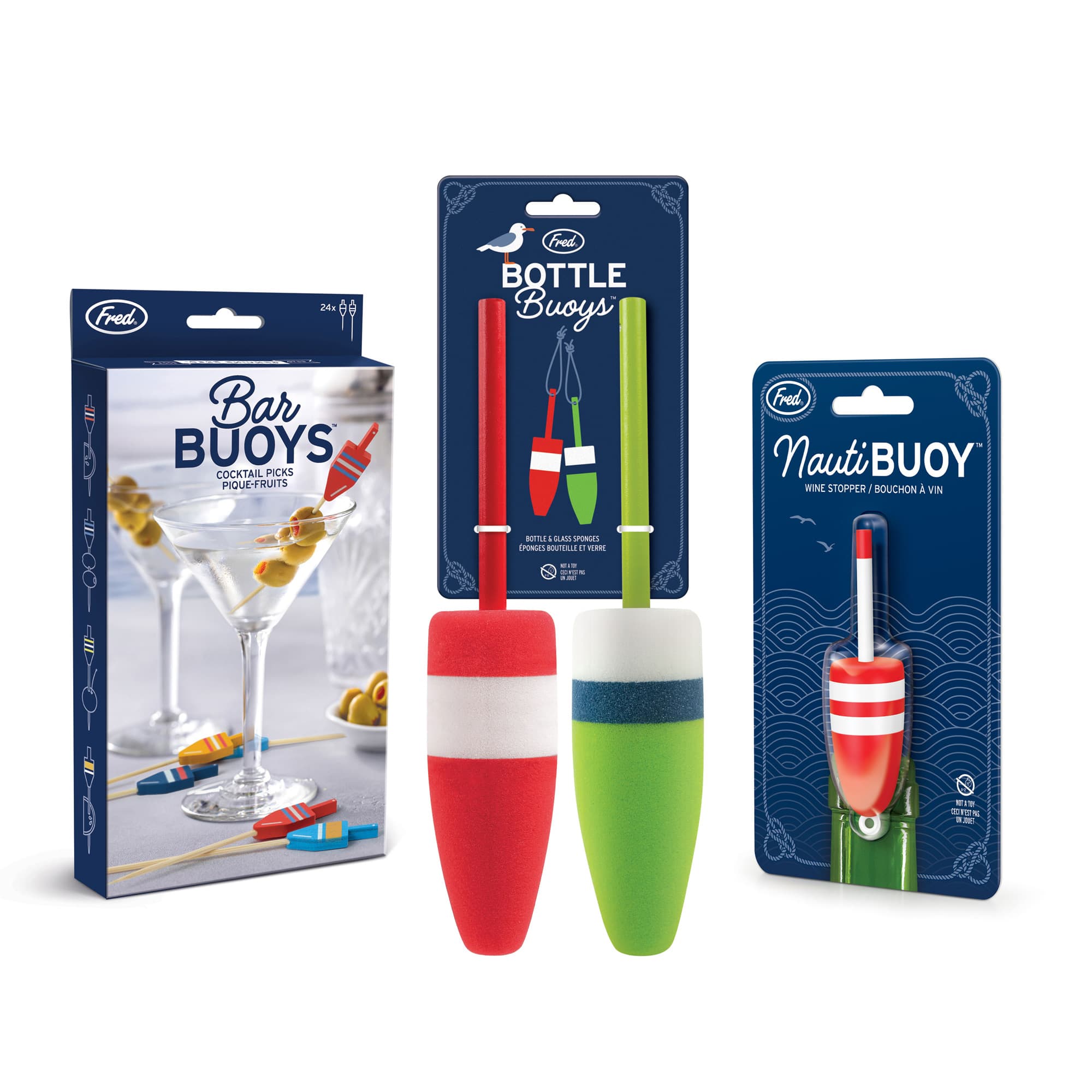 Three Fred brandbuoy productsaccessories displayed on a white background: a boxed Bar Buoys set, a boxed Bottle Buoys set with two floating buoys in front, and a boxed Nauti BUOY set with one floating buoy in front.