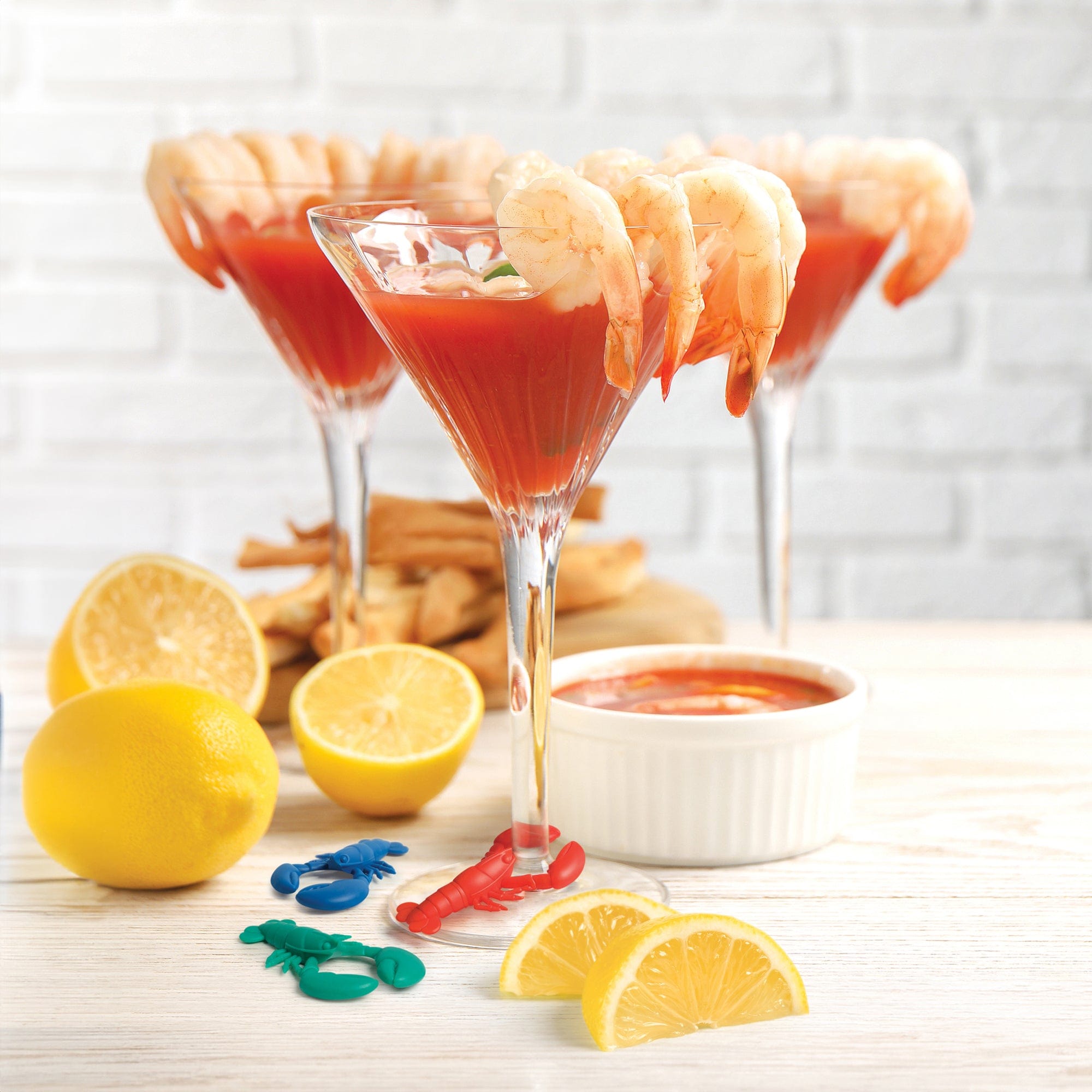 Silicone wine stem charms that look like lobsters.