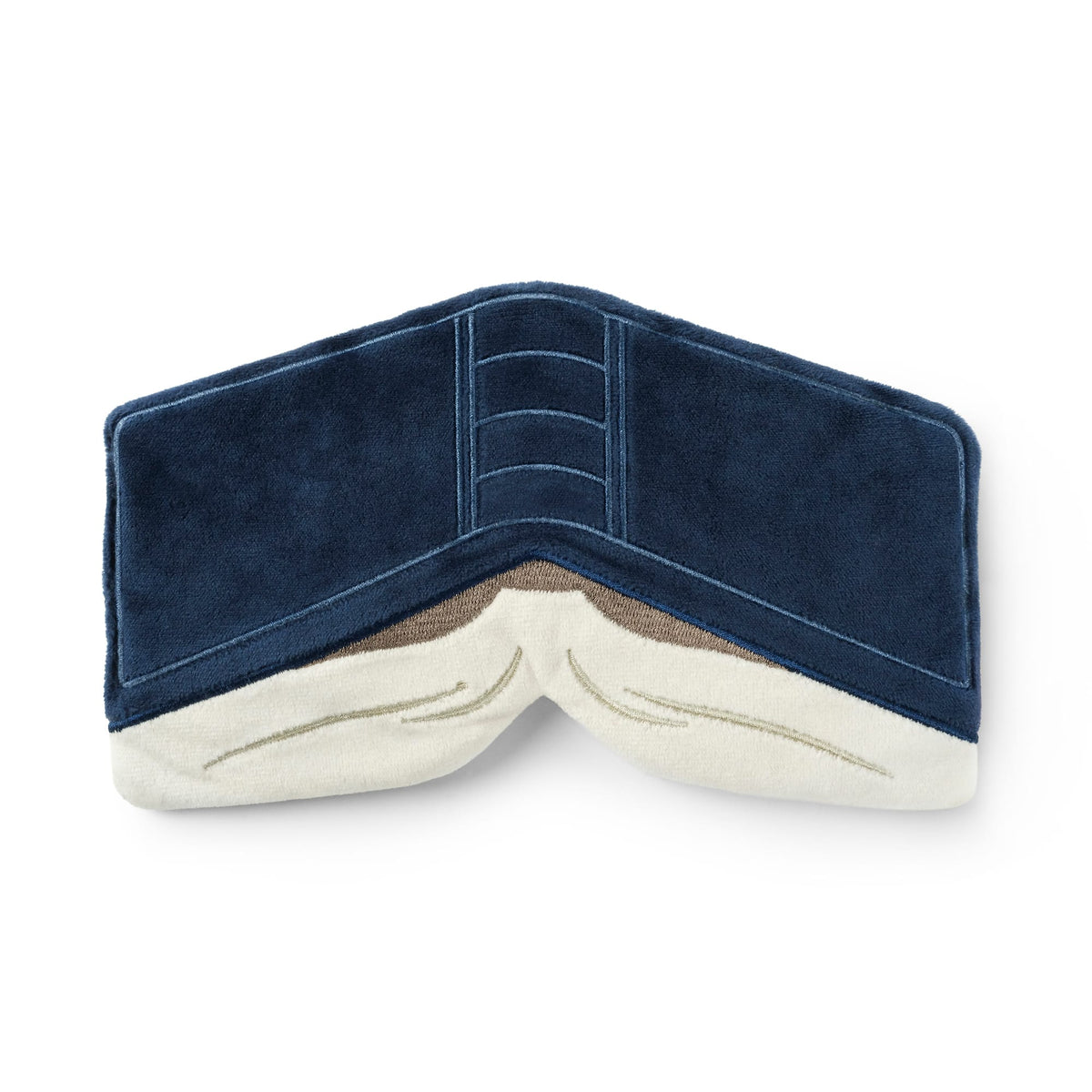 Dark blue denim patch with stitched detailing against a white background