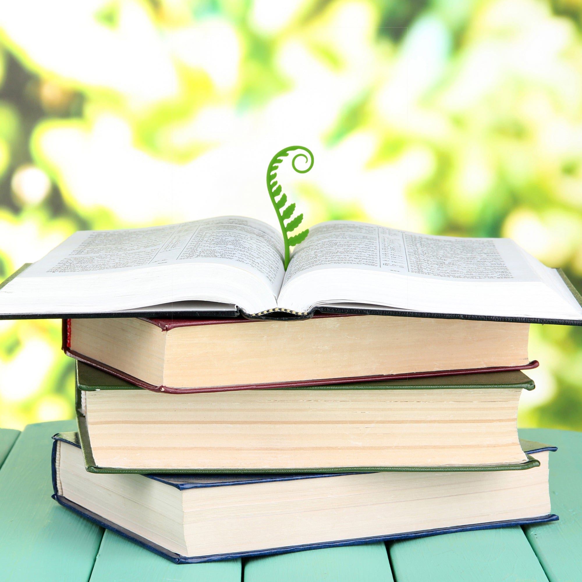 Woodland Sprouts - fern bookmarks in a book