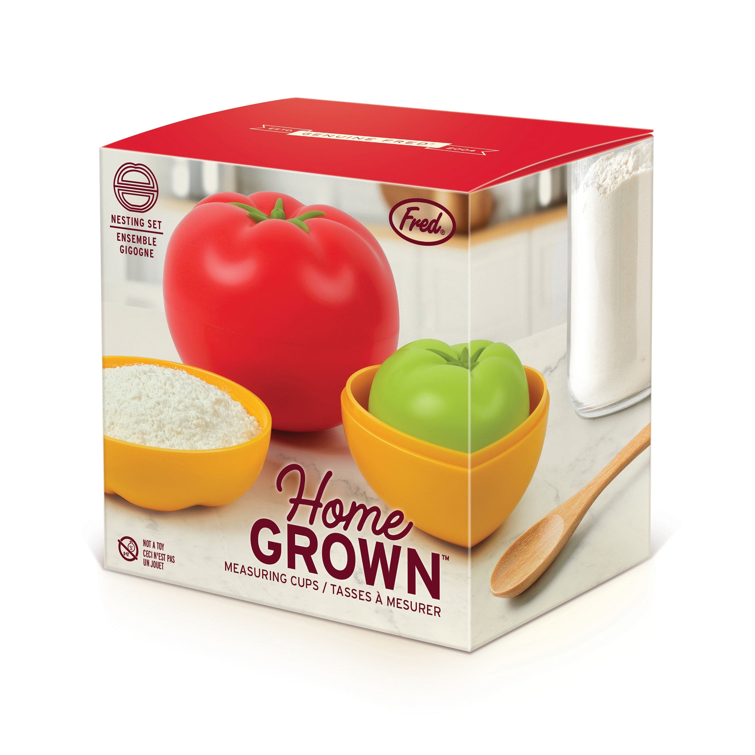 Packaging box of 'Home Grown' measuring cups with tomato and bowl design on a white background