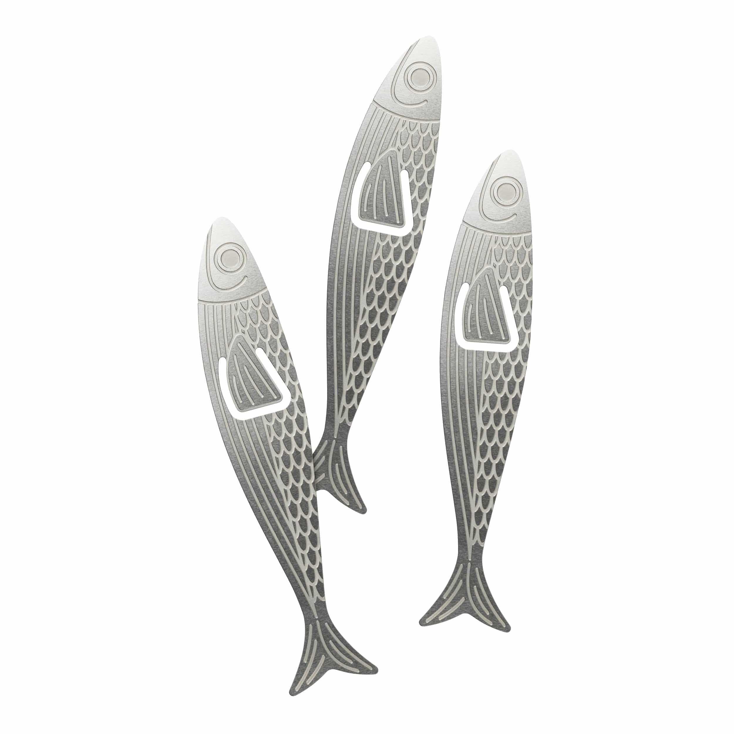 Metallic fish-shaped bookmarks on a white background
