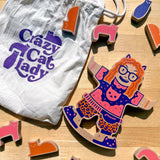 Jogo de tabuleiro The Crazy Cat Lady Game Fig. 6: Boneca Crazy