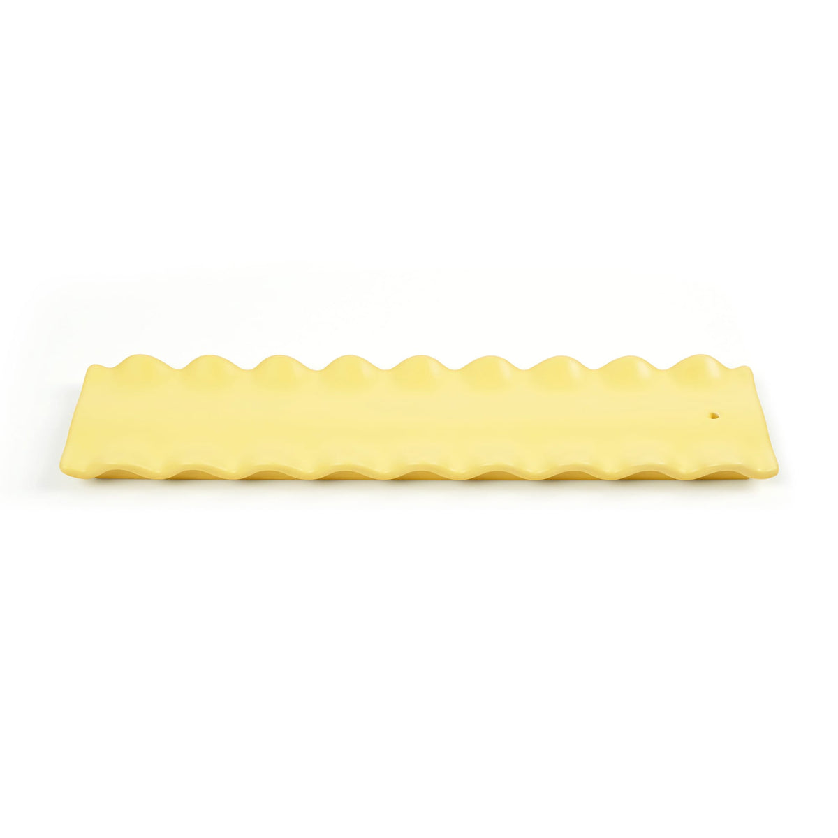 CARB APPEAL yellow wavy edge silicone mat on white background