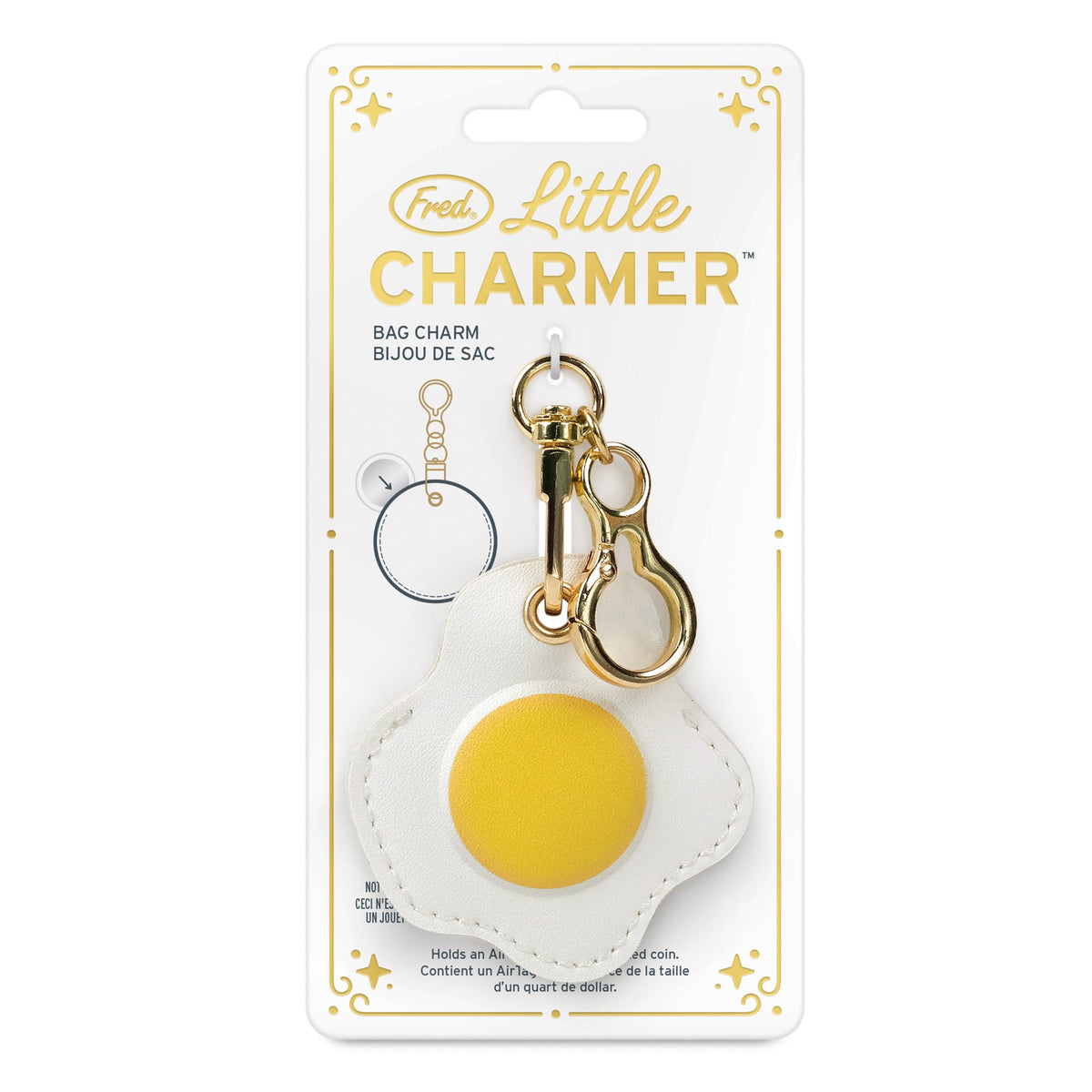 Fried egg design Little Charmer bag charm displayed on its gift-ready gold foil-stamped backer card. A highly recommended, ready-to-give holiday gift and easy stocking stuffer for $10.