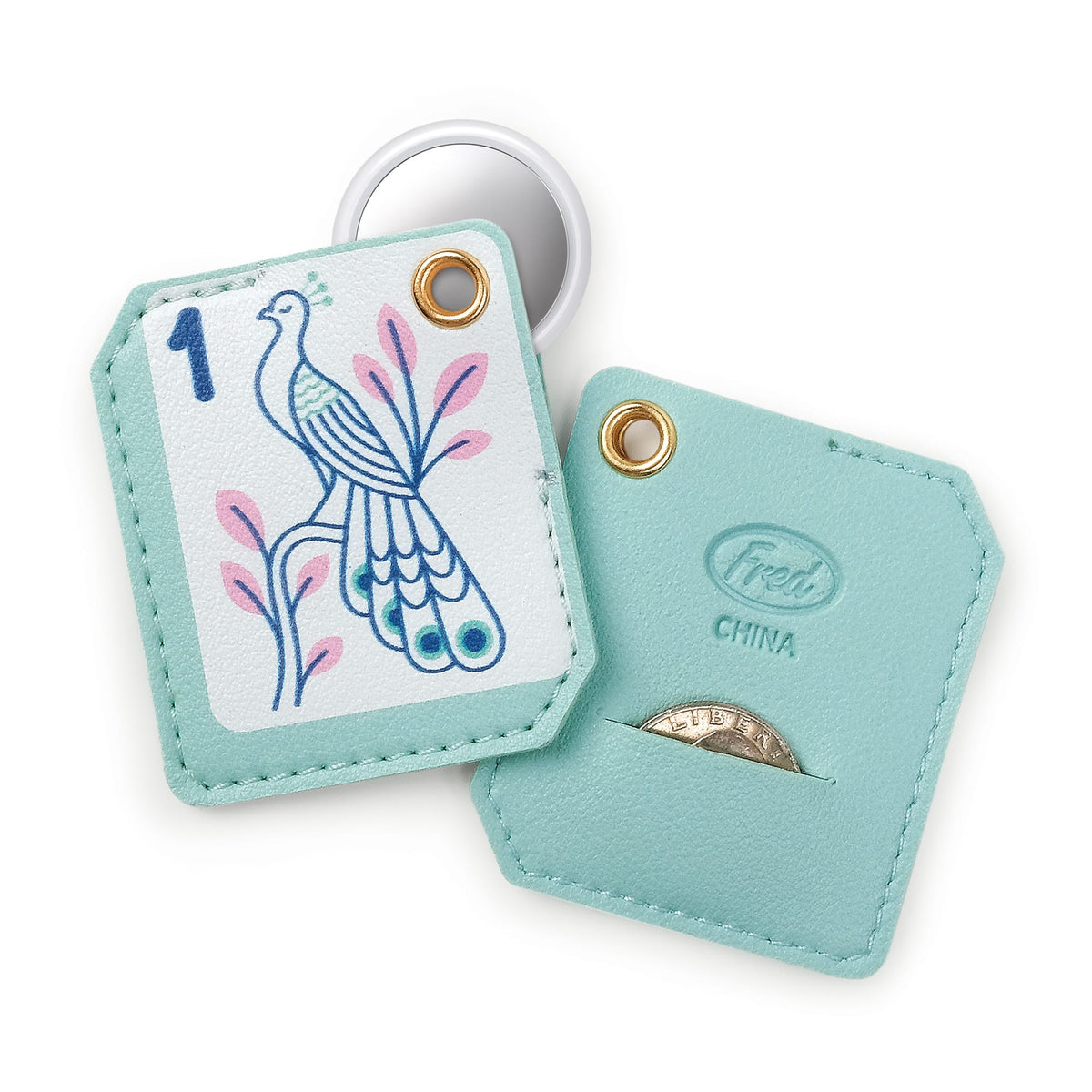 Back view of the Mahjong bag charm highlighting the hidden Apple AirTag® holder and emergency quarter slot. A clever, affordable tech accessory holiday gift and stocking stuffer.