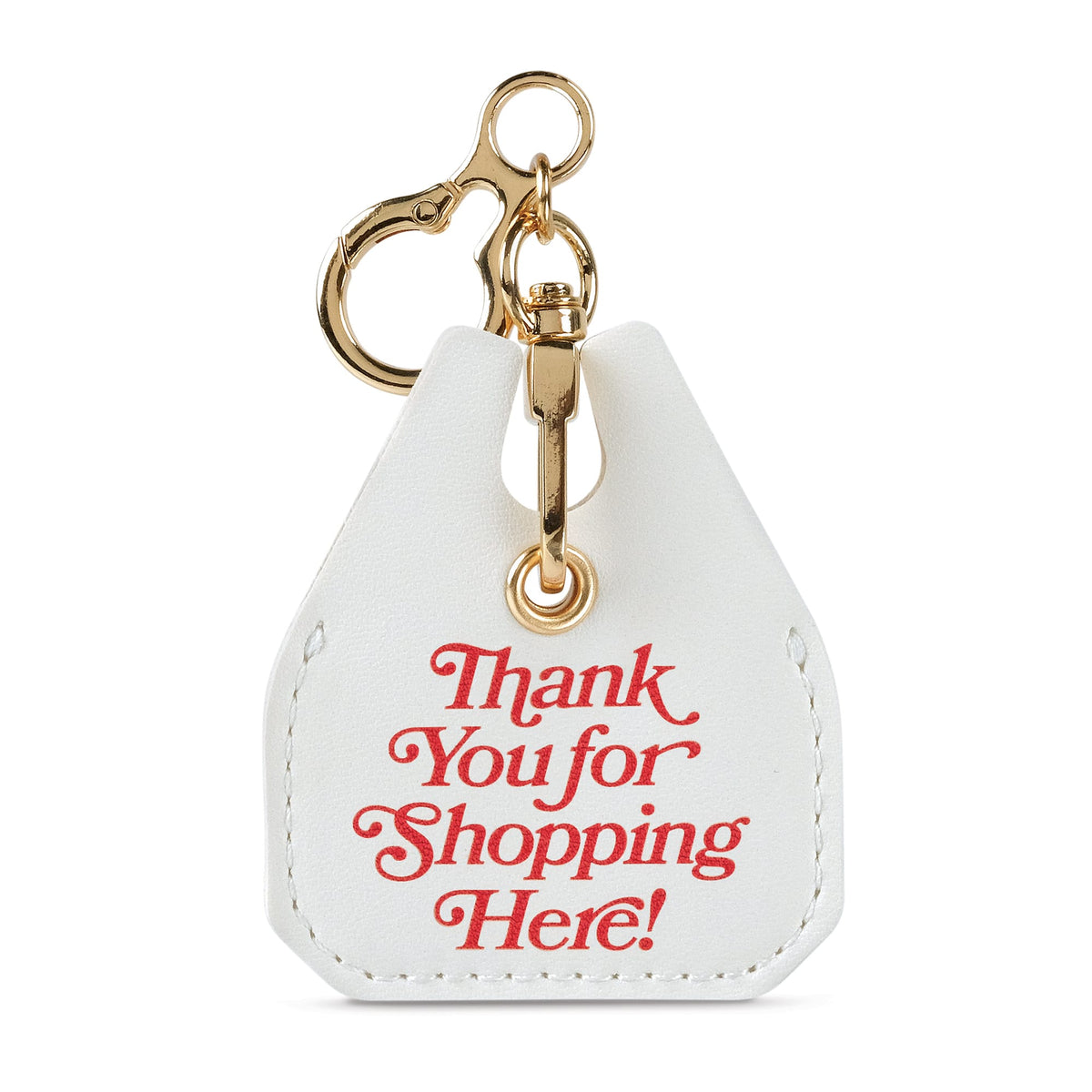 White faux leather bag charm shaped like a classic takeout bag reading 'Thank You for Shopping Here!'. An ideal practical holiday gift and easy stocking stuffer under $10 for frequent shoppers.