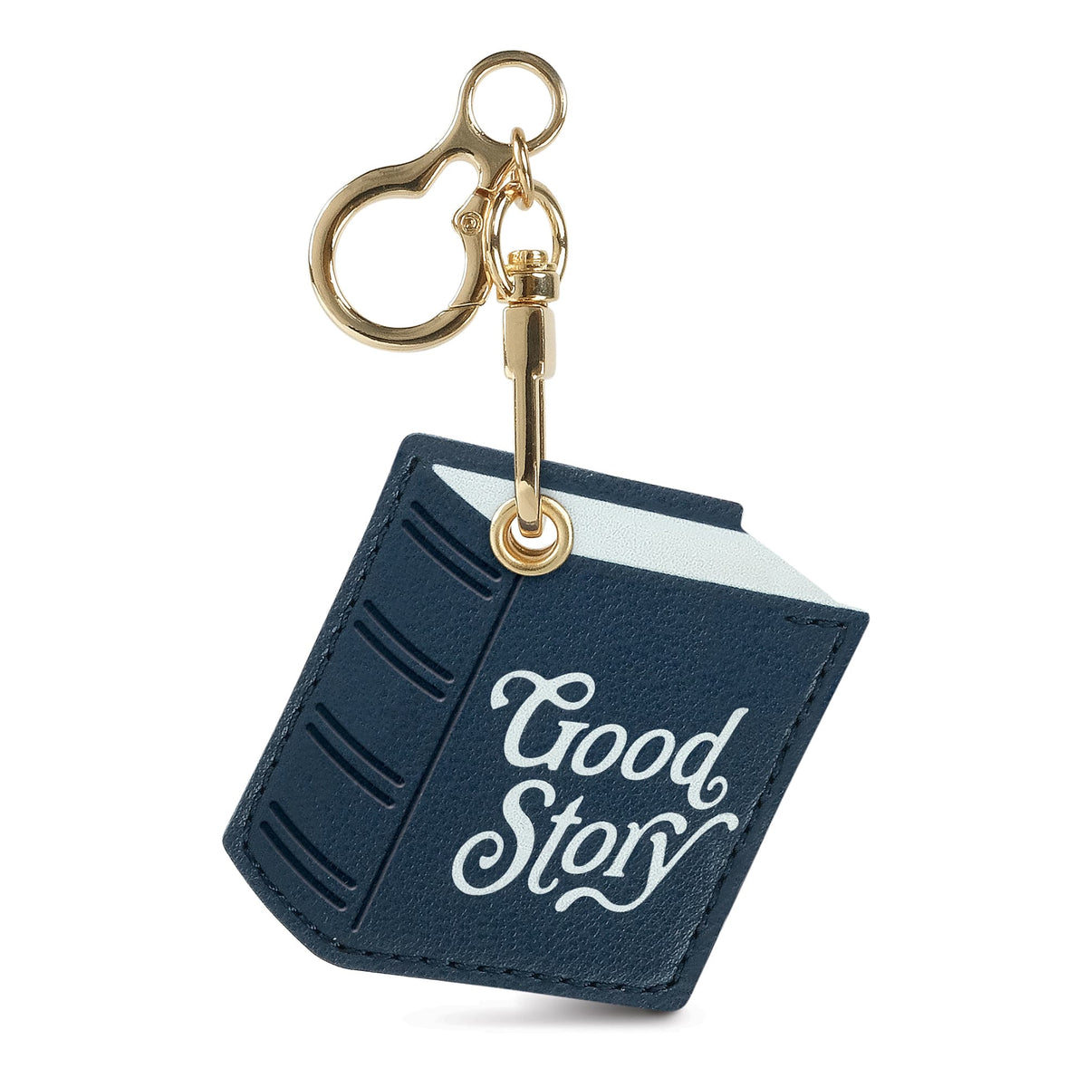 Blue book-shaped vegan leather bag charm with 'Good Story' text on a gold keyring. A perfect gift for book lovers and an easy stocking stuffer $10 and under.