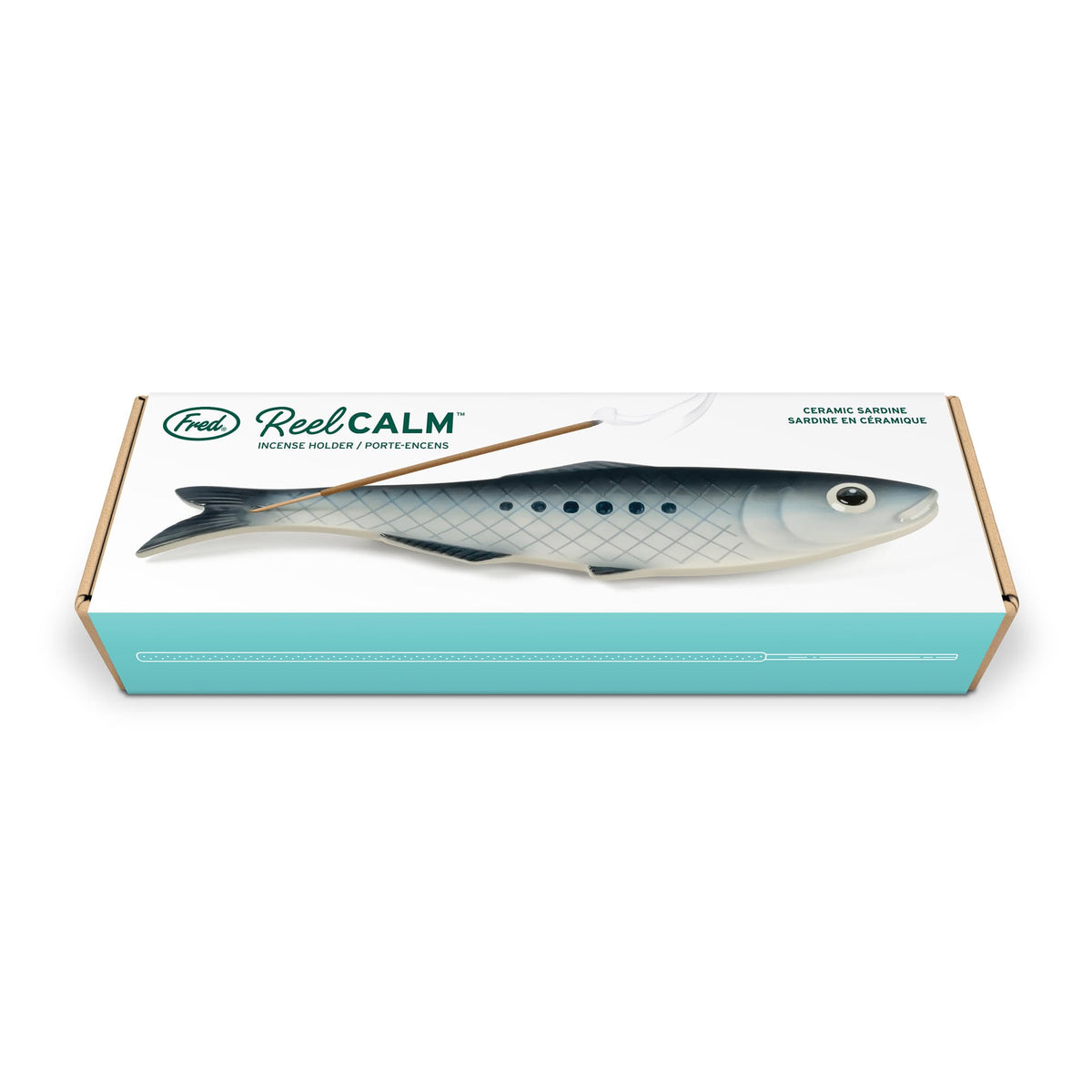 Reel Calm incense holder packaging box with a large fish illustration and teal accents.