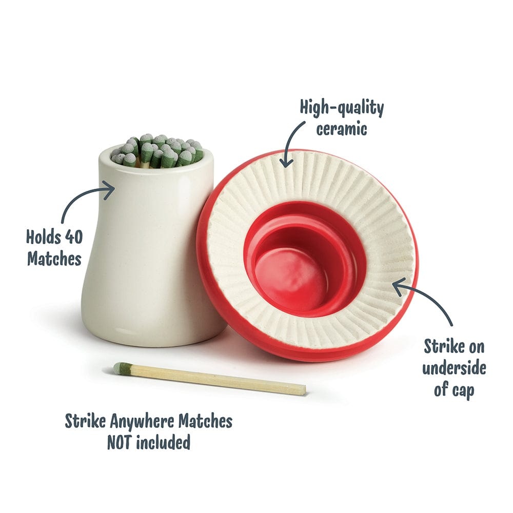 A ceramic vessel holding matches. The top of the vessel looks like a mushroom and is placed upside down. The image calls out various features: "holds 40 matches", "High quality ceramic", "Strike on underside of cap". Strike Anywhere Matches not included